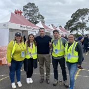 Michael Sukkar MP posing with four volunteers from Holy Spirit Community at their Fete